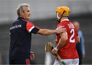 31 July 2021; Niall O'Leary of Cork with his manager Kieran Kingston as he is substituted late in the second half during the GAA Hurling All-Ireland Senior Championship Quarter-Final match between Dublin and Cork at Semple Stadium in Thurles, Tipperary. Photo by Piaras Ó Mídheach/Sportsfile