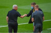 3 August 2021; Bohemians manager Keith Long, left, fist-bumps former Bohemians goalkeeper Shane Supple before the UEFA Europa Conference League third qualifying round first leg match between Bohemians and PAOK at Aviva Stadium in Dublin. Photo by Ben McShane/Sportsfile