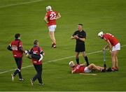 31 July 2021; Luke Meade of Cork receives medical attention for an injury during the GAA Hurling All-Ireland Senior Championship Quarter-Final match between Dublin and Cork at Semple Stadium in Thurles, Tipperary. Photo by Piaras Ó Mídheach/Sportsfile