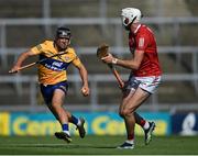 23 July 2021; David Reidy of Clare in action against Tim O'Mahony of Cork during the GAA Hurling All-Ireland Senior Championship Round 2 match between Clare and Cork at LIT Gaelic Grounds in Limerick. Photo by Piaras Ó Mídheach/Sportsfile