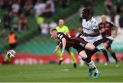 3 August 2021; Ross Tierney of Bohemians is tackled by Anderson Esiti of PAOK during the UEFA Europa Conference League third qualifying round first leg match between Bohemians and PAOK at Aviva Stadium in Dublin. Photo by Harry Murphy/Sportsfile
