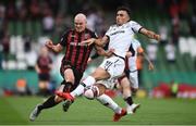 3 August 2021; Georgie Kelly of Bohemians in action against Giannis Michailidis of PAOK during the UEFA Europa Conference League third qualifying round first leg match between Bohemians and PAOK at Aviva Stadium in Dublin. Photo by Ben McShane/Sportsfile