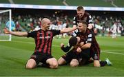 3 August 2021; Ali Coote of Bohemians celebrates after scoring his side's first goal with team-mates Georgie Kelly, Liam Burt and Ross Tierney during the UEFA Europa Conference League third qualifying round first leg match between Bohemians and PAOK at Aviva Stadium in Dublin. Photo by Harry Murphy/Sportsfile