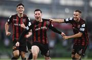 3 August 2021; Ali Coote of Bohemians celebrates after scoring his side's second goal with team-mates Liam Burt, right, and Dawson Devoy during the UEFA Europa Conference League third qualifying round first leg match between Bohemians and PAOK at Aviva Stadium in Dublin. Photo by Ben McShane/Sportsfile