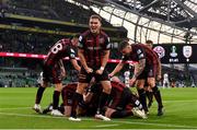 3 August 2021; Bohemians players, including Anto Breslin, centre, celebrates after their side's second goal, scored by Ali Coote, hidden, during the UEFA Europa Conference League third qualifying round first leg match between Bohemians and PAOK at Aviva Stadium in Dublin. Photo by Ben McShane/Sportsfile