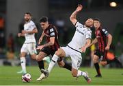 3 August 2021; Dawson Devoy of Bohemians in action against Jasmin Kurtic of PAOK during the UEFA Europa Conference League third qualifying round first leg match between Bohemians and PAOK at Aviva Stadium in Dublin. Photo by Harry Murphy/Sportsfile