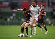3 August 2021; Andy Lyons of Bohemians in action against Omar El Kaddouri of PAOK during the UEFA Europa Conference League third qualifying round first leg match between Bohemians and PAOK at Aviva Stadium in Dublin. Photo by Harry Murphy/Sportsfile