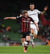 3 August 2021; Conor Levingston of Bohemians in action against Jasmin Kurtic of PAOK during the UEFA Europa Conference League third qualifying round first leg match between Bohemians and PAOK at Aviva Stadium in Dublin. Photo by Ben McShane/Sportsfile
