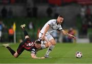 3 August 2021; Jasmin Kurtic of PAOK in action against  Andy Lyons of Bohemians during the UEFA Europa Conference League third qualifying round first leg match between Bohemians and PAOK at Aviva Stadium in Dublin. Photo by Harry Murphy/Sportsfile