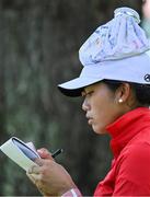 4 August 2021; Bianca Pagdanganan of Philippines marks her card while attempting to keep cool with an ice pack on her head during round one of the women's individual stroke play at the Kasumigaseki Country Club during the 2020 Tokyo Summer Olympic Games in Kawagoe, Saitama, Japan. Photo by Brendan Moran/Sportsfile