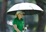 4 August 2021; Stephanie Meadow of Ireland uses an umbrella to shelter from the heat on the 14th fairway during round one of the women's individual stroke play at the Kasumigaseki Country Club during the 2020 Tokyo Summer Olympic Games in Kawagoe, Saitama, Japan. Photo by Brendan Moran/Sportsfile