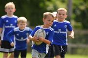 4 August 2021; Paul McVeigh, age 6, in action during the Bank of Ireland Leinster Rugby Summer Camp at Coolmine RFC in Dublin. Photo by Matt Browne/Sportsfile