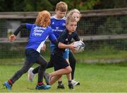 4 August 2021; Conor Hayes, age 8, in action during the Bank of Ireland Leinster Rugby Summer Camp at Coolmine RFC in Dublin. Photo by Matt Browne/Sportsfile