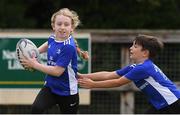4 August 2021; Katie Walker, age 8, in action during the Bank of Ireland Leinster Rugby Summer Camp at Coolmine RFC in Dublin. Photo by Matt Browne/Sportsfile