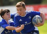 4 August 2021; Darragh Farrelly, age 10, in action during the Bank of Ireland Leinster Rugby Summer Camp at Coolmine RFC in Dublin. Photo by Matt Browne/Sportsfile