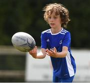 4 August 2021; Lucas Cahill, age 8, in action during the Bank of Ireland Leinster Rugby Summer Camp at Coolmine RFC in Dublin. Photo by Matt Browne/Sportsfile