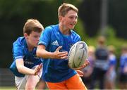 4 August 2021; Bruce O'Brien, age 12, in action during the Bank of Ireland Leinster Rugby Summer Camp at Coolmine RFC in Dublin. Photo by Matt Browne/Sportsfile