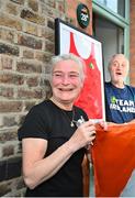 5 August 2021; Yvonne and Christy Harrington, parents of Olympic boxing medallist Kellie Harrington, celebrate after watching her Tokyo 2020 Olympics lightweight semi-final bout from home at Portland Row in Dublin. Photo by Sam Barnes/Sportsfile