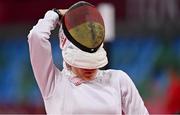 5 August 2021; Rebecca Langrehr of Germany removes her faceguard during the women's individual fencing ranking round at Musashino Forest Sport Plaza on day 13 during the 2020 Tokyo Summer Olympic Games in Tokyo, Japan. Photo by Brendan Moran/Sportsfile
