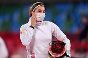5 August 2021; Rebecca Langrehr of Germany removes her facemask before competition during the women's individual fencing ranking round at Musashino Forest Sport Plaza on day 13 during the 2020 Tokyo Summer Olympic Games in Tokyo, Japan. Photo by Brendan Moran/Sportsfile
