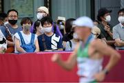 5 August 2021; Spectators watch as David Kenny of Ireland competes in the men's 20 kilometre walk final at Sapporo Odori Park on day 13 during the 2020 Tokyo Summer Olympic Games in Sapporo, Japan. Photo by Ramsey Cardy/Sportsfile