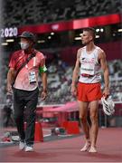 5 August 2021; Marcin Lewandowski of Poland after pulling out with an injury from the semi-final of the men's 1500 metres at the Olympic Stadium on day 13 during the 2020 Tokyo Summer Olympic Games in Tokyo, Japan. Photo by Stephen McCarthy/Sportsfile