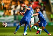 5 August 2021; Ronan Finn of Shamrock Rovers in action against Blerim Kotobelli, centre, and Jackson of Teuta during the UEFA Europa Conference League third qualifying round first leg match between Shamrock Rovers and Teuta at Tallaght Stadium in Dublin. Photo by Eóin Noonan/Sportsfile