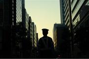 6 August 2021; A policeman on patrol prior to the men's 50 kilometre walk final at Sapporo Odori Park on day 14 during the 2020 Tokyo Summer Olympic Games in Sapporo, Japan. Photo by Ramsey Cardy/Sportsfile