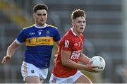 22 July 2021; Darragh Cashman of Cork in action against Keith Grogan of Tipperary during the EirGrid Munster GAA Football U20 Championship Final match between Cork and Tipperary at Semple Stadium in Thurles, Tipperary. Photo by Piaras Ó Mídheach/Sportsfile