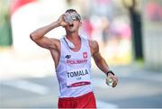 6 August 2021; Race leader Dawid Tomala of Poland drinks water during the men's 50 kilometre walk final at Sapporo Odori Park on day 14 during the 2020 Tokyo Summer Olympic Games in Sapporo, Japan. Photo by Ramsey Cardy/Sportsfile
