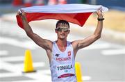 6 August 2021; Dawid Tomala of Poland celebrates on his way to winning the men's 50 kilometre walk final at Sapporo Odori Park on day 14 during the 2020 Tokyo Summer Olympic Games in Sapporo, Japan. Photo by Ramsey Cardy/Sportsfile