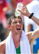 6 August 2021; Brendan Boyce of Ireland uses water to cool down after finishing in 10th place during the men's 50 kilometre walk final at Sapporo Odori Park on day 14 during the 2020 Tokyo Summer Olympic Games in Sapporo, Japan. Photo by Ramsey Cardy/Sportsfile