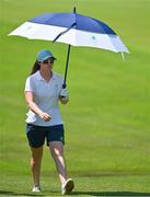 6 August 2021; Leona Maguire of Ireland uses an umbrella to shelter from the sun during round three of the women's individual stroke play at the Kasumigaseki Country Club during the 2020 Tokyo Summer Olympic Games in Kawagoe, Saitama, Japan. Photo by Brendan Moran/Sportsfile