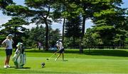 6 August 2021; Leona Maguire of Ireland plays from the 12th tee box, watched by Stephanie Meadow of Ireland, during round three of the women's individual stroke play at the Kasumigaseki Country Club during the 2020 Tokyo Summer Olympic Games in Kawagoe, Saitama, Japan. Photo by Brendan Moran/Sportsfile