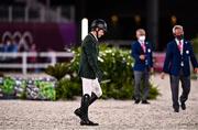 6 August 2021; Shane Sweetnam of Ireland walks off after being eliminated from from falling off of Alejandro at the 9th fence during the jumping team qualifier at the Equestrian Park during the 2020 Tokyo Summer Olympic Games in Tokyo, Japan. Photo by Brendan Moran/Sportsfile
