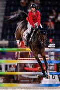 6 August 2021; Laura Kraut of the United States riding Baloutinue during the jumping team qualifier at the Equestrian Park during the 2020 Tokyo Summer Olympic Games in Tokyo, Japan. Photo by Brendan Moran/Sportsfile