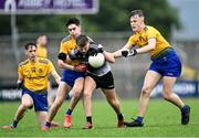 6 August 2021; Stephen Rogan of Sligo in action against Senan Lambe, left, and Conor Harley of Roscommon during the Electric Ireland Connacht GAA Minor 2021 Final match between Roscommon and Sligo at Dr Hyde Park in Roscommon. Photo by Piaras Ó Mídheach/Sportsfile