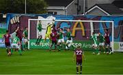 6 August 2021; Mark McNulty of Cork City punches the ball clear under pressure from Wilson Waweru of Galway United during the SSE Airtricity League First Division match between Galway United and Cork City at Eamonn Deacy Park in Galway. Photo by Ray McManus/Sportsfile