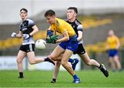 6 August 2021; Shane Walsh of Roscommon is tackled by Conor Johnston of Sligo during the Electric Ireland Connacht GAA Minor 2021 Final match between Roscommon and Sligo at Dr Hyde Park in Roscommon. Photo by Piaras Ó Mídheach/Sportsfile