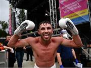 6 August 2021; Sean McComb celebrates after defeating Vincente Martin Rodriguez in their super lightweight bout at Falls Park in Belfast. Photo by David Fitzgerald/Sportsfile