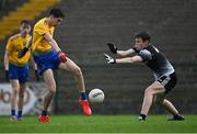 6 August 2021; Senan Lambe of Roscommon shoots under pressure from Robert O'Kelly Lynch of Sligo during the Electric Ireland Connacht GAA Minor 2021 Final match between Roscommon and Sligo at Dr Hyde Park in Roscommon. Photo by Piaras Ó Mídheach/Sportsfile