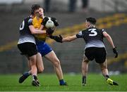 6 August 2021; Robert Heneghan of Roscommon is tackled by Mark McDaniel, left, and Conor Johnston of Sligo during the Electric Ireland Connacht GAA Minor 2021 Final match between Roscommon and Sligo at Dr Hyde Park in Roscommon. Photo by Piaras Ó Mídheach/Sportsfile