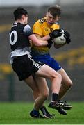 6 August 2021; Robert Heneghan of Roscommon is tackled by Mark McDaniel of Sligo during the Electric Ireland Connacht GAA Minor 2021 Final match between Roscommon and Sligo at Dr Hyde Park in Roscommon. Photo by Piaras Ó Mídheach/Sportsfile