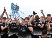 6 August 2021; Ronan O'Hehir of Sligo celebrates with the cup alongside his team-mates after the Electric Ireland Connacht GAA Minor 2021 Final match between Roscommon and Sligo at Dr Hyde Park in Roscommon. Photo by Piaras Ó Mídheach/Sportsfile
