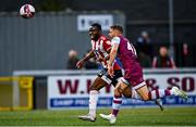 6 August 2021; James Akintunde of Derry City in action against Dane Massey of Drogheda United during the SSE Airtricity League Premier Division match between Derry City and Drogheda United at Ryan McBride Brandywell Stadium in Derry. Photo by Eóin Noonan/Sportsfile