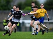 6 August 2021; Brian Duffy of Sligo in action against James Brady of Roscommon during the Electric Ireland Connacht GAA Minor 2021 Final match between Roscommon and Sligo at Dr Hyde Park in Roscommon. Photo by Piaras Ó Mídheach/Sportsfile