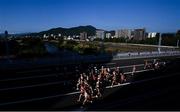 7 August 2021; Runners in action at the Horohira Bridge during the women's marathon at Sapporo Odori Park on day 15 during the 2020 Tokyo Summer Olympic Games in Sapporo, Japan. Photo by Ramsey Cardy/Sportsfile