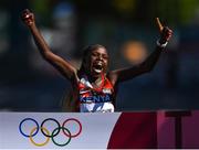 7 August 2021; Peres Jepchirchir of Kenya crosses the finish line to win the women's marathon at Sapporo Odori Park on day 15 during the 2020 Tokyo Summer Olympic Games in Sapporo, Japan. Photo by Ramsey Cardy/Sportsfile