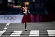 7 August 2021; Peres Jepchirchir of Kenya on her way to winning the women's marathon at Sapporo Odori Park on day 15 during the 2020 Tokyo Summer Olympic Games in Sapporo, Japan. Photo by Ramsey Cardy/Sportsfile