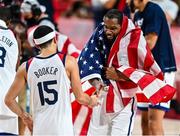 7 August 2021; Kevin Durant of USA celebrates with team-mate Devin Booker after the men's gold medal match between the USA and France at the Saitama Super Arena during the 2020 Tokyo Summer Olympic Games in Tokyo, Japan. Photo by Brendan Moran/Sportsfile